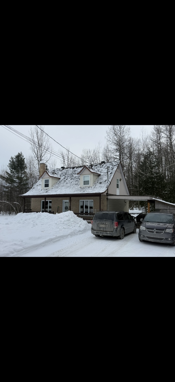 Déneigement de toiture après intervention